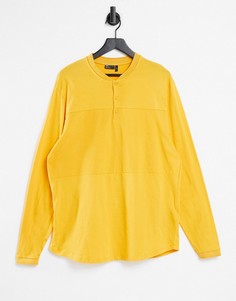 Желтый лонгслив в бейсбольном стиле из ткани пике с вставками ASOS DESIGN