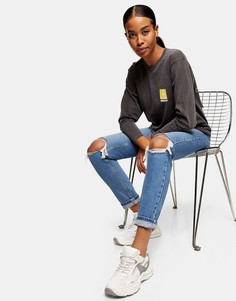 Голубые джинсы в винтажном стиле со рваной отделкой Topshop-Голубой