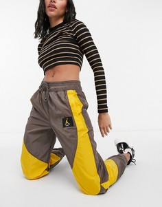 Коричневые текстильные штаны с золотистыми вставками Jordan-Серый