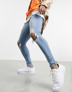 Голубые джинсы с напылением и рваной отделкой ASOS DESIGN-Голубой