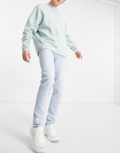 Выбеленные зауженные джинсы ASOS DESIGN-Голубой