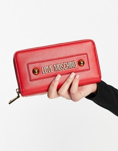 Красный удлиненный кошелек с декоративными заклепками Love Moschino