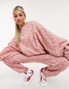 Кирпично-розовый укороченный свитшот со сплошным принтом логотипа Nike-Розовый цвет