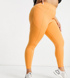 Леггинсы с моделирующим эффектом и карманом ASOS 4505 Curve-Оранжевый цвет