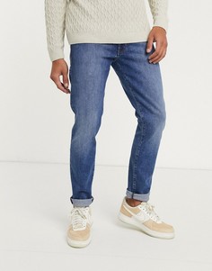Зауженные книзу джинсы Wrangler-Темно-синий