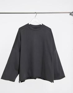 Черный выбеленный свитшот из органического хлопка в стиле "extreme oversized" с необработанным краем ASOS DESIGN
