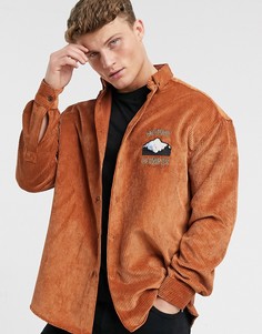 Вельветовая рубашка oversized в стиле 90-х с вышивкой на груди ASOS DESIGN-Оранжевый цвет