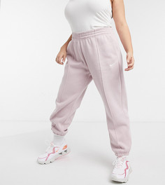 Джоггеры светло-розового цвета в стиле oversized с маленьким логотипом-галочкой Nike Plus-Розовый цвет