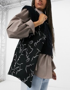 Большая хлопковая сумка-шопер с принтом в виде лиц ASOS DESIGN-Черный цвет