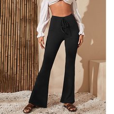 Трикотажные расклешенные брюки с узлом Shein