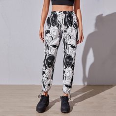 Брюки с узлом и графическим принтом Shein
