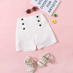 Однотонные двубортные шорты для девочек Shein