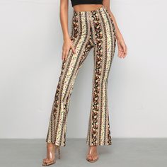 Расклешенные брюки с цветочным принтом Shein