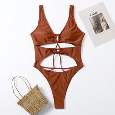 Слитный купальник с узлом и разрезом Shein