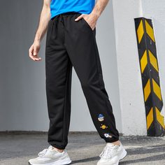 на кулиске Мультяшный принт Мужские спортивные брюки Shein