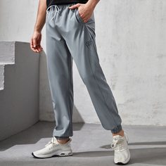 Мужские спортивные брюки с текстовым принтом на кулиске Shein