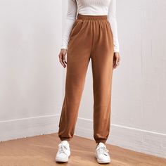 Спортивные брюки с эластичной талией и карманом Shein