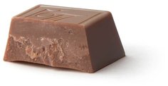 Шоколад молочный 33% какао в пирамидках Томер, 1 кг. No Brand