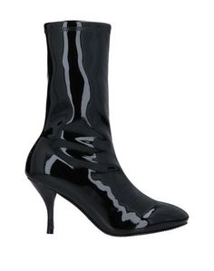 Полусапоги и высокие ботинки Stuart Weitzman