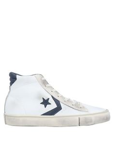 Высокие кеды и кроссовки Converse