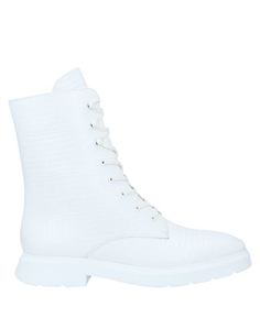 Полусапоги и высокие ботинки Stuart Weitzman