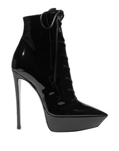 Полусапоги и высокие ботинки Saint Laurent