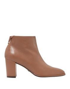 Полусапоги и высокие ботинки Stuart Weitzman