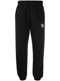 Opening Ceremony warped logo track pants