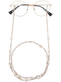 Valentino Eyewear очки в круглой оправе с логотипом VLogo