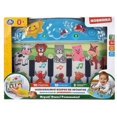 Музыкальный коврик на кроватку с завязками, Дружинина. "Умка"