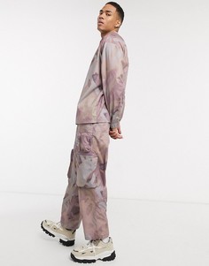 Широкие брюки от комплекта с 3D-карманами и принтом в виде аэрозольной краски ASOS DESIGN-Розовый цвет