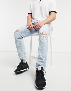 Светлые зауженные джинсы с рваной отделкой American Eagle-Голубой