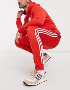 Красные спортивные брюки adidas Originals-Красный