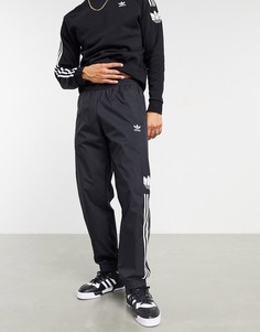 Черные джоггеры с объемным принтом трилистника и тремя полосками adidas Originals-Черный цвет