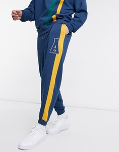 Темно-синие oversized-джоггеры со вставками-полосками от комплекта ASOS Actual-Темно-синий