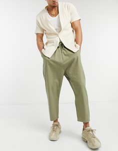 Брюки-чиносы цвета хаки с заниженным шаговым швом ASOS DESIGN-Зеленый