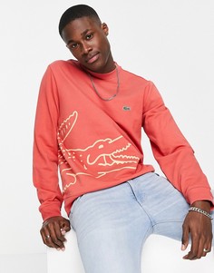 Красный свитшот с круглым вырезом и схематичным рисунком крокодила Lacoste