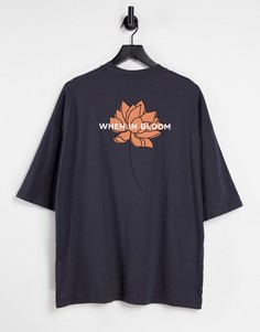 Черная oversized футболка с принтом в виде цветка и надписью на спине ASOS DESIGN-Черный