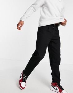 Черные суженные книзу джинсы свободного кроя со складками ASOS DESIGN-Черный цвет