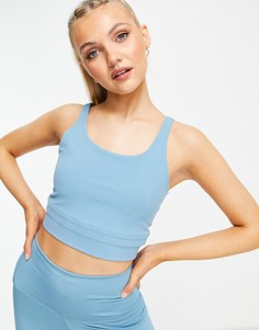 Синий укороченный топ с легкой степенью поддержки Nike Yoga Luxe-Голубой