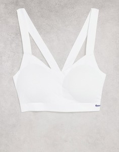 Белый уплотненный спортивный кроп-топ с перекрестной спинкой Reebok