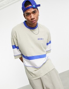 Выбеленная oversized-футболка цвета хаки со вставками и принтом на груди ASOS DESIGN-Зеленый цвет