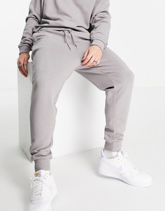 Серый спортивный костюм из oversized-свитшота и джоггеров с заниженным шаговым швом ASOS DESIGN