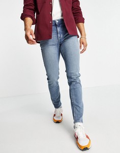 Зауженные светло-голубые джинсы с выбеленным эффектом и оттенком ASOS DESIGN-Голубой