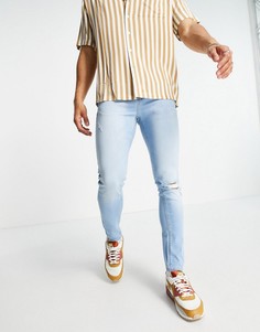 Светлые эластичные супероблегающие джинсы с рваными коленями ASOS DESIGN-Голубой