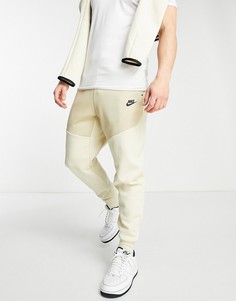 Флисовые джоггеры песочного цвета Nike Tech-Нейтральный