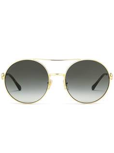 Gucci Eyewear солнцезащитные очки в круглой оправе с декором Horsebit