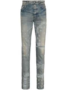 AMIRI джинсы с эффектом потертости и принтом