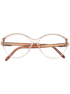 Yves Saint Laurent Pre-Owned очки 1980-х годов в круглой оправе черепаховой расцветки