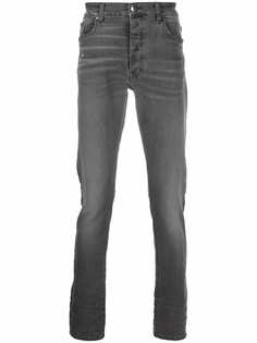 AMIRI узкие джинсы с эффектом потертости